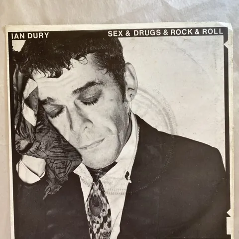 Ian Dury — Sex & Drugs & Rock & Roll / Razzle In My Pocket