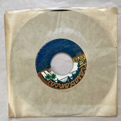 Kiss — Rock And Roll All Nite (Live Version) / Rock And Roll All Nite (Studio Version)